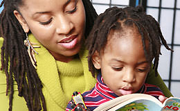 Mother reading to son Mother reading to son